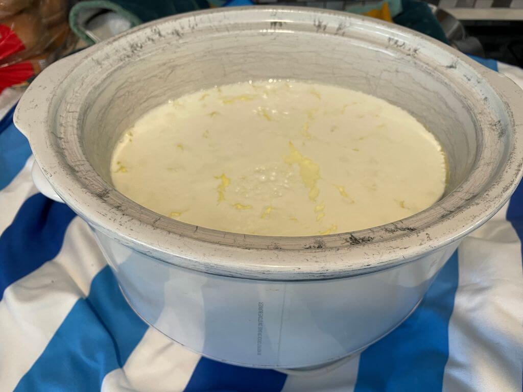 Slow Cooker Filled With Milk And Starter Yogurt Ready To Set Overnight For Homemade Greek Yogurt 2