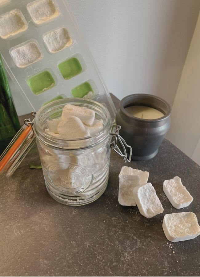 Homemade dishwasher detergent tablets in silicone mold ready to dry – natural cleaning DIY